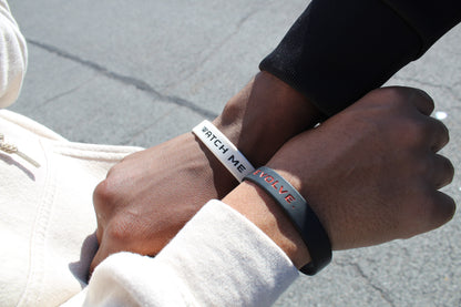 "Watch Me Evolve." 2 Wristbands package